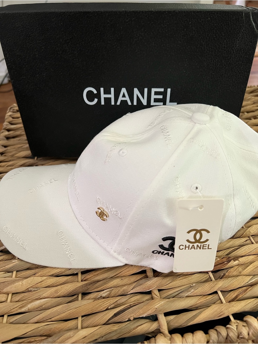 Chanel baseball cap.